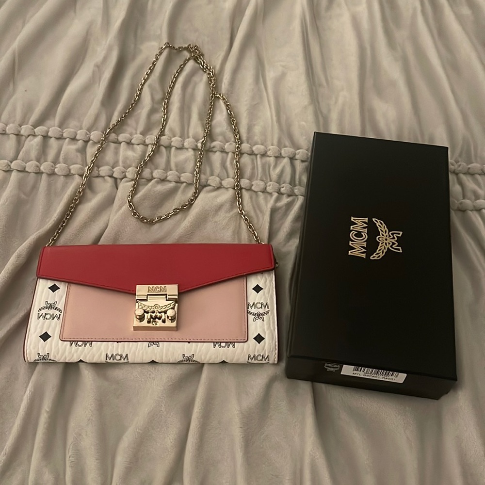 This MCM Cross Body Bag is a limited edition bag that is multi-colored.
